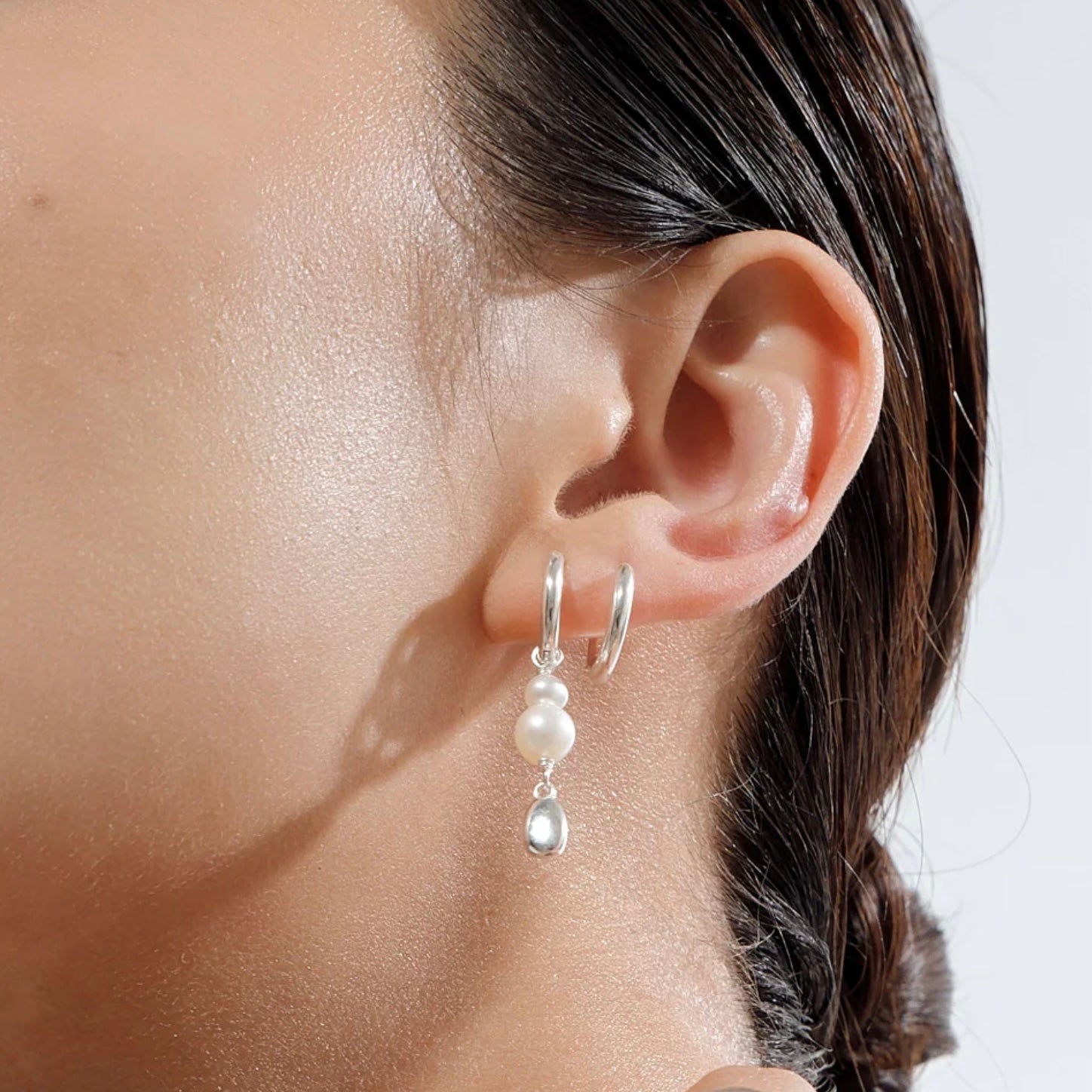 Linda Tahija - Brook Pearl Huggie Hoops - The Flower Crate